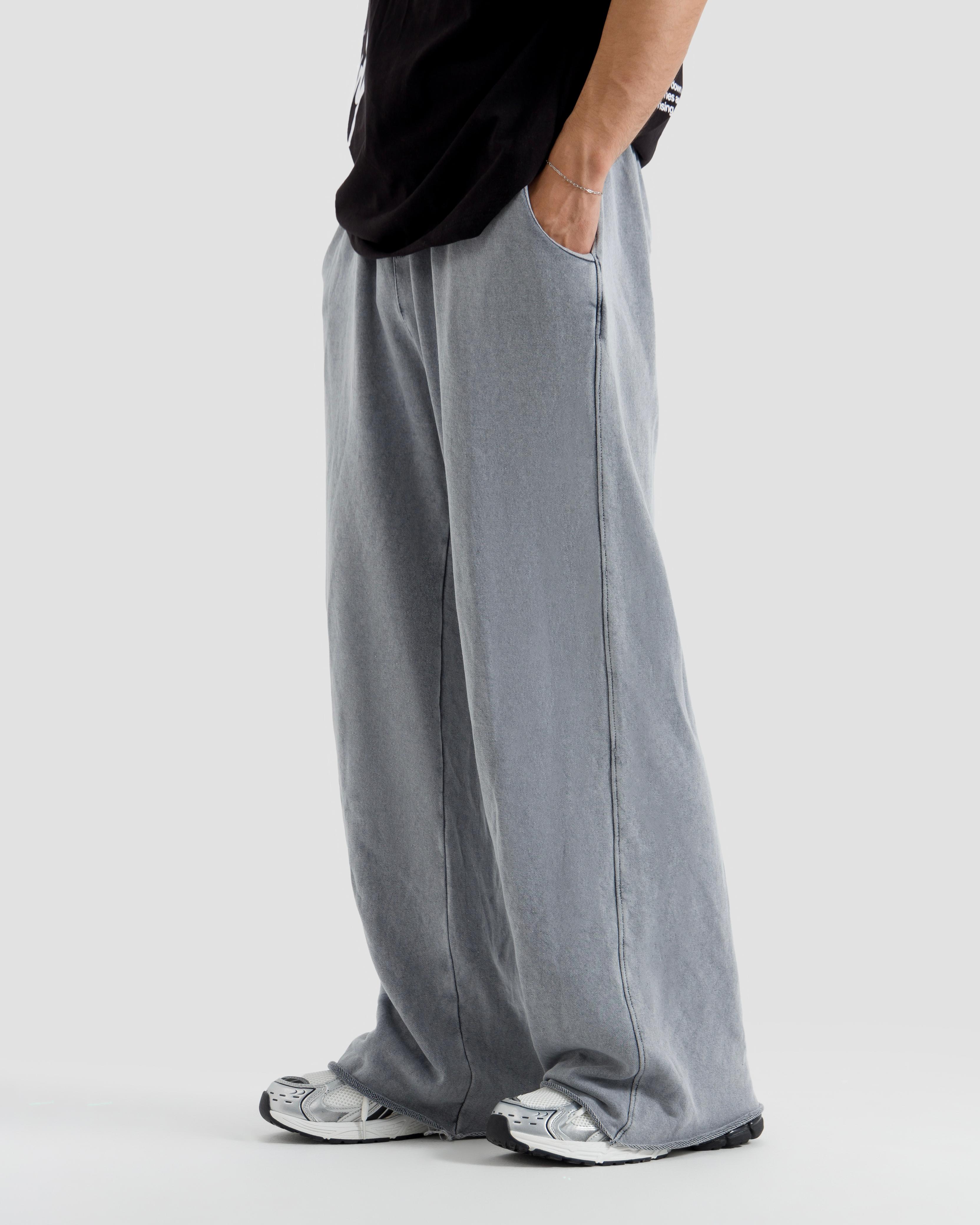 Washed Baggy Trousers With Raw Edges