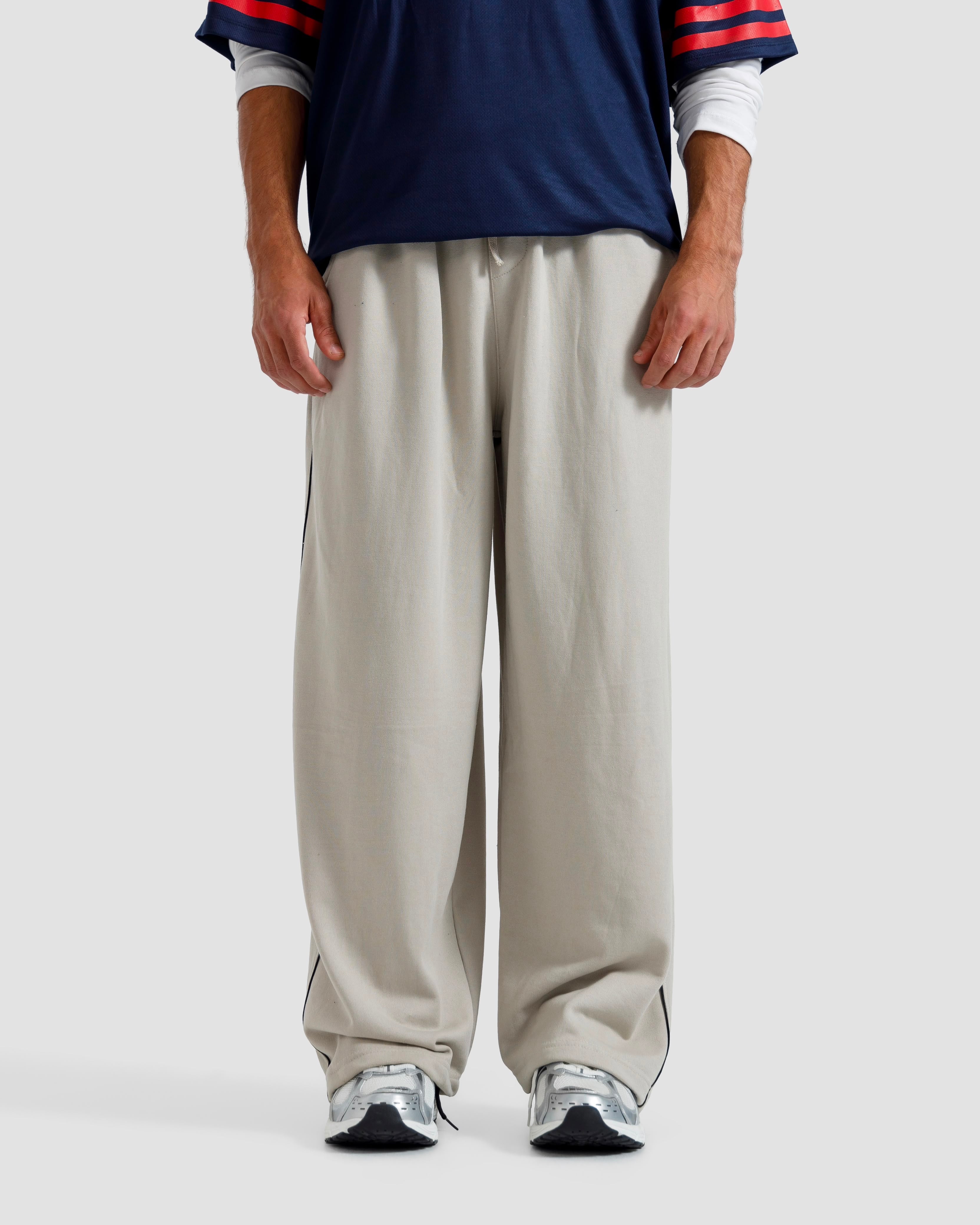 Baggy Fit Trousers With Piping Detail