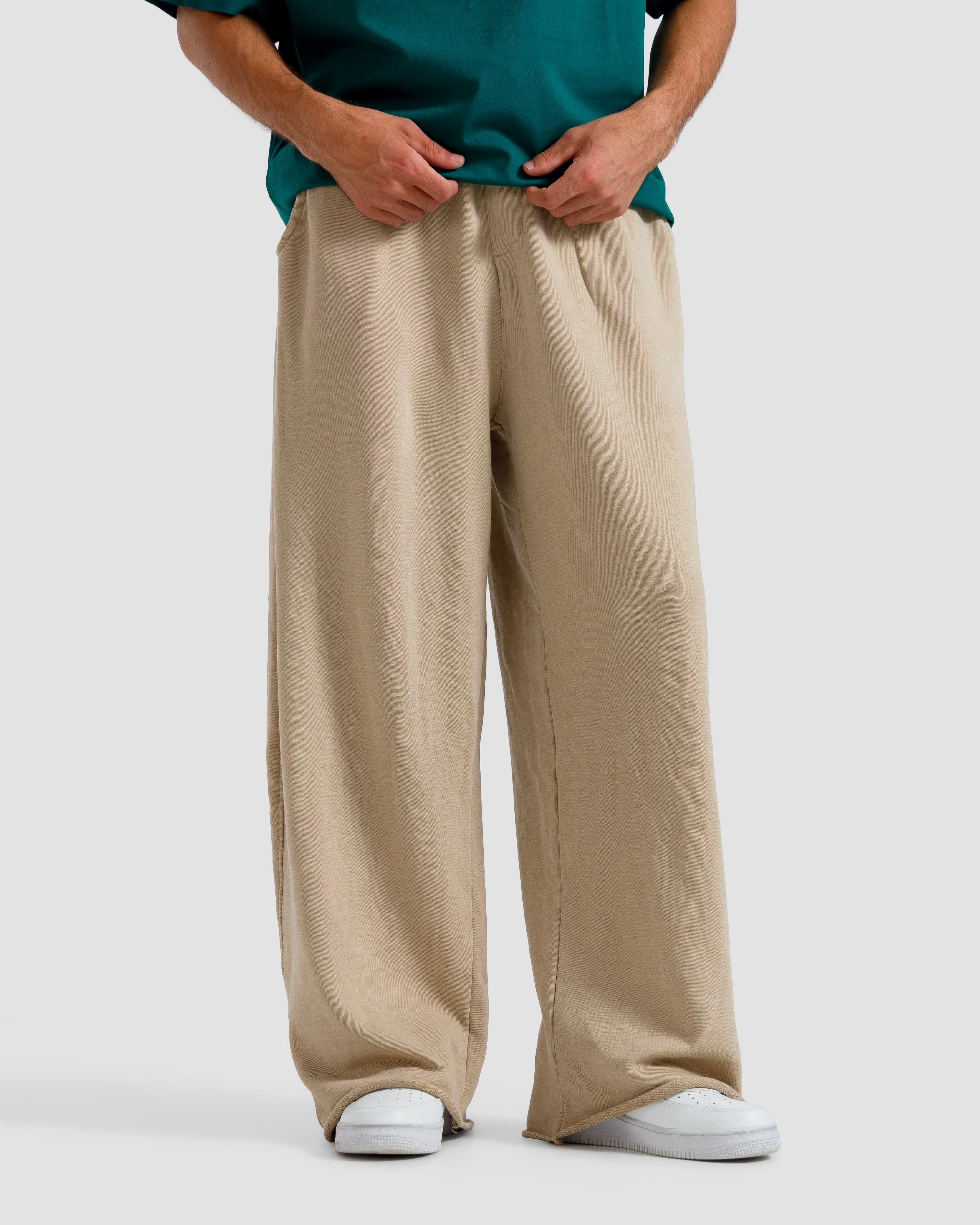 Washed Baggy Trousers With Raw Edges