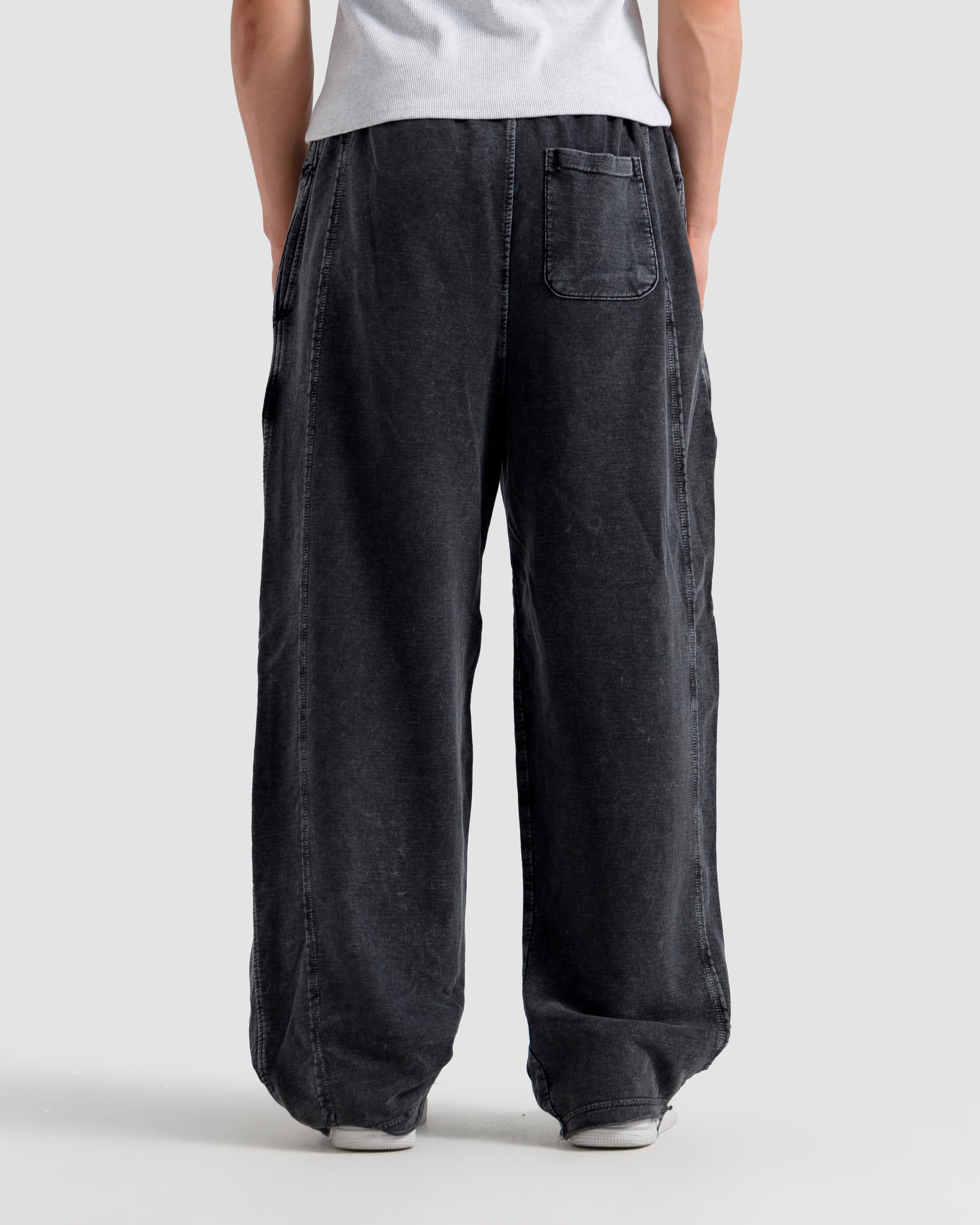 Washed Baggy Trousers With Raw Edges