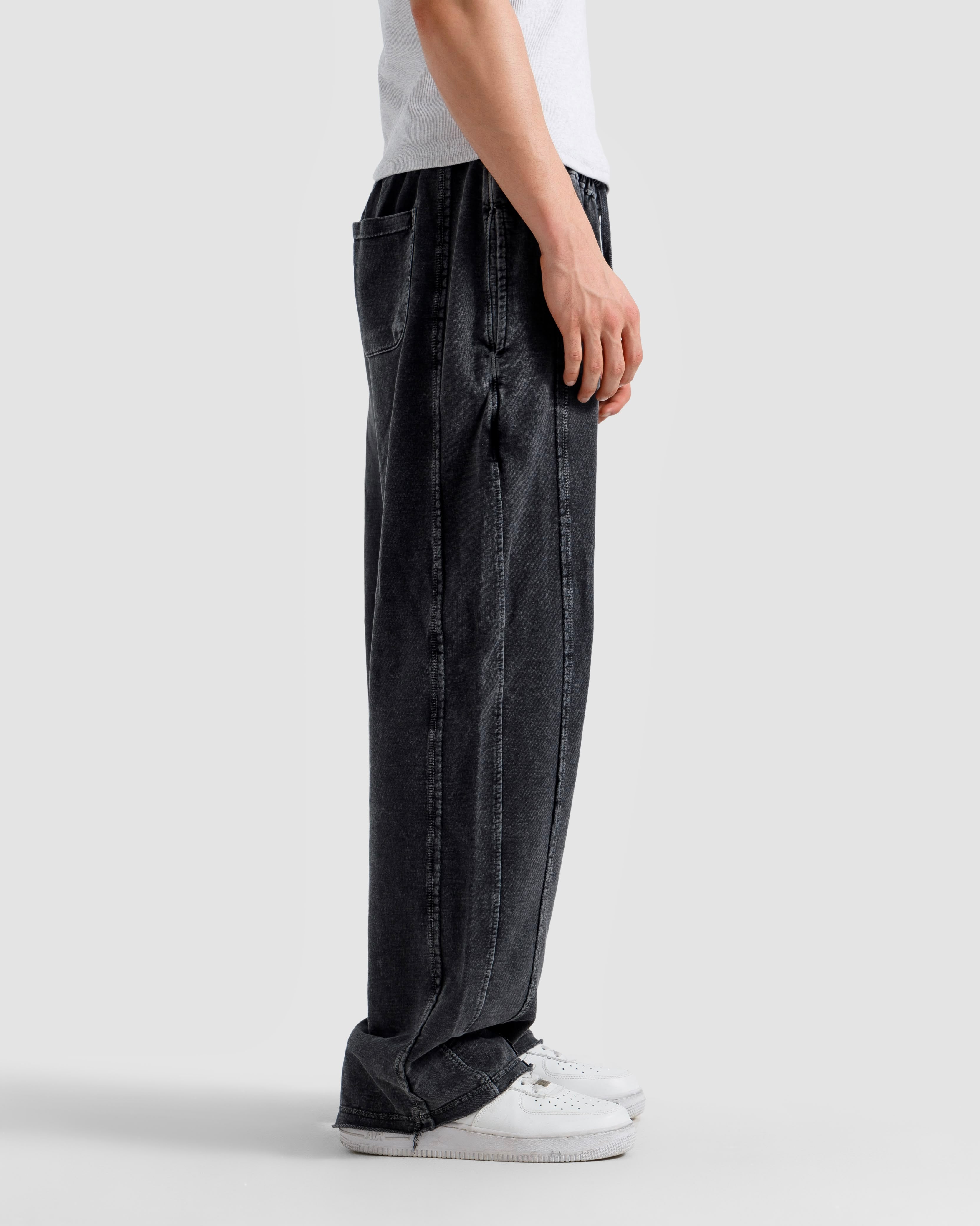 Washed Baggy Trousers With Raw Edges