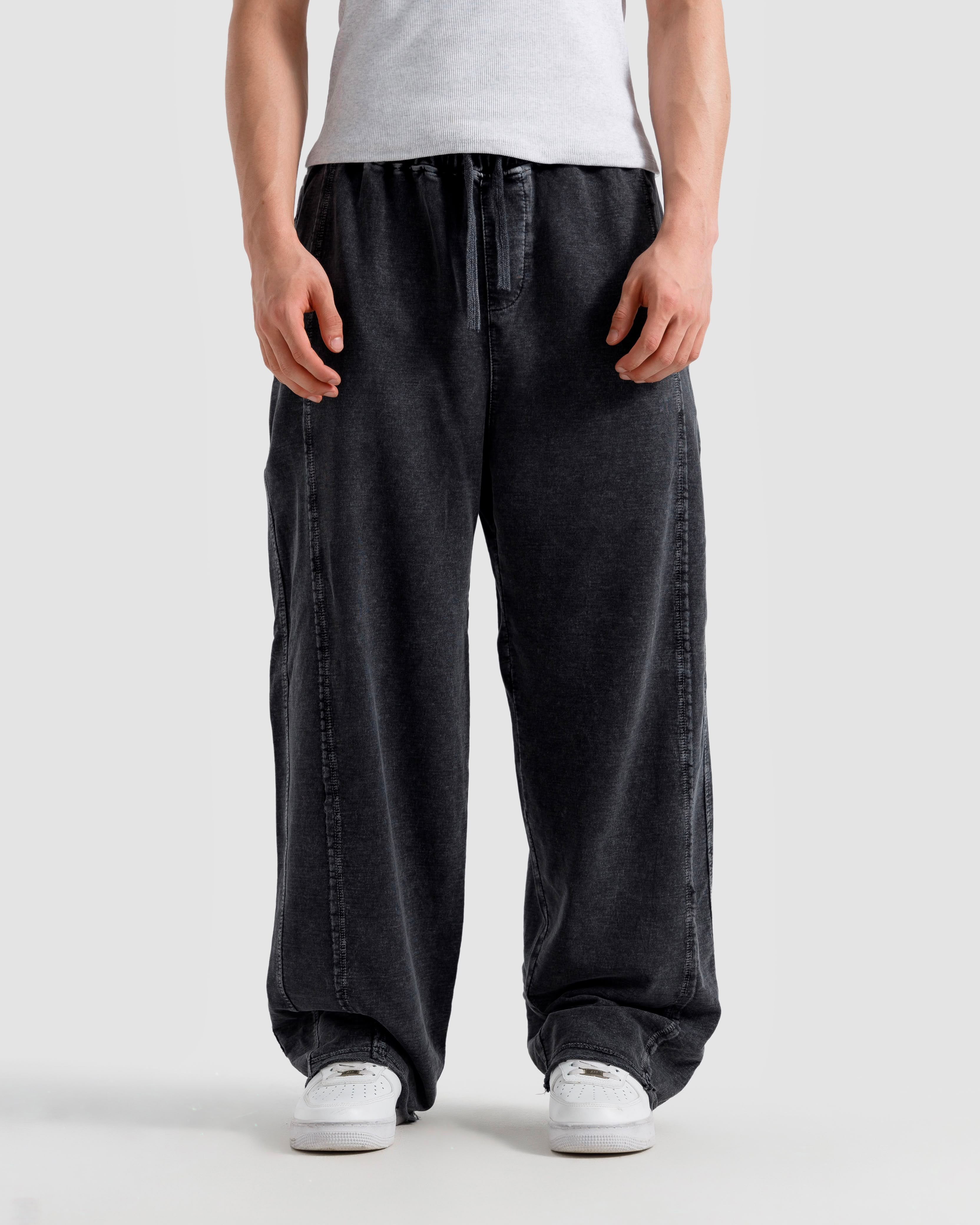 Washed Baggy Trousers With Raw Edges