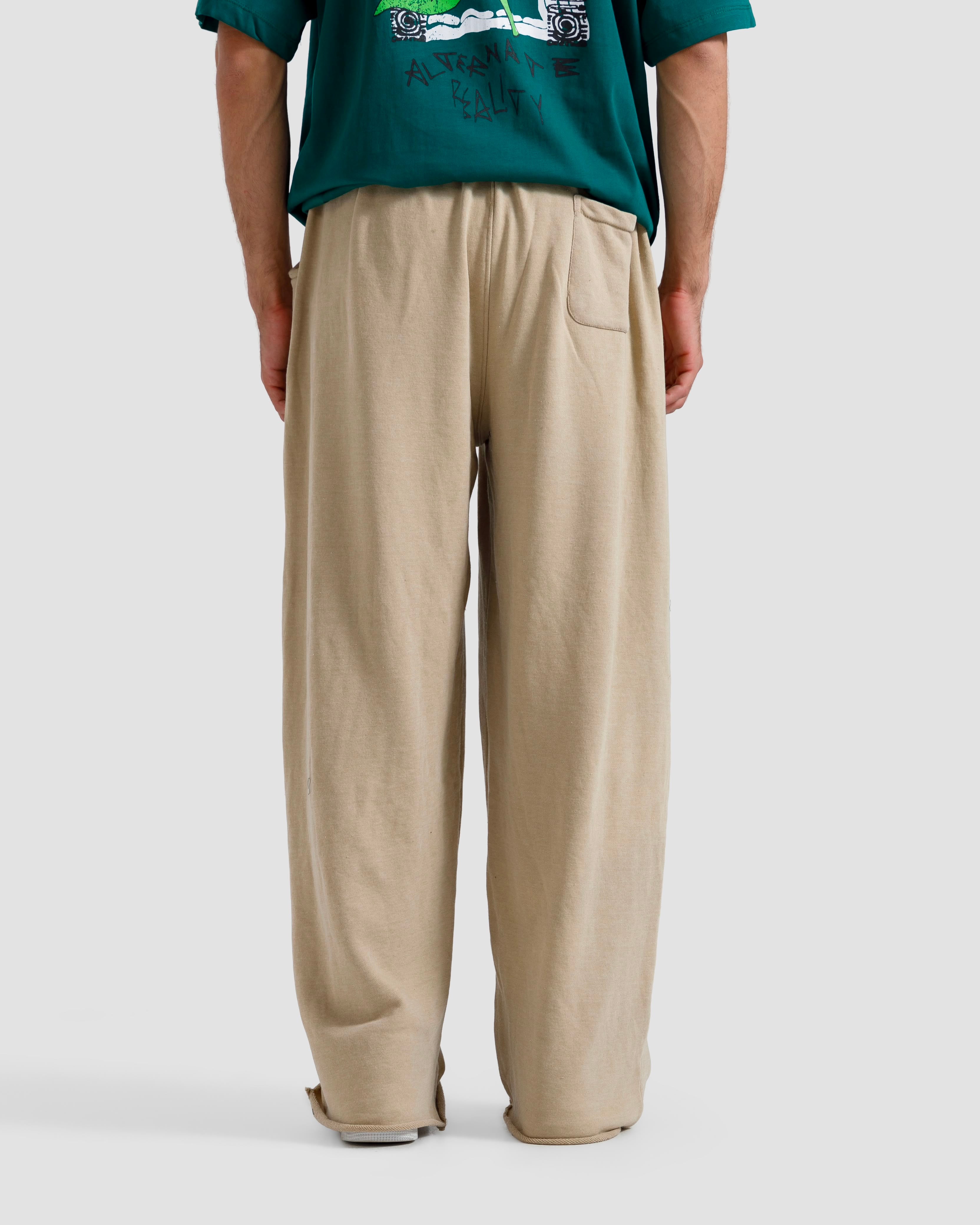 Washed Baggy Trousers With Raw Edges