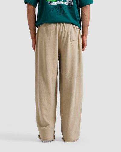Washed Baggy Trousers With Raw Edges
