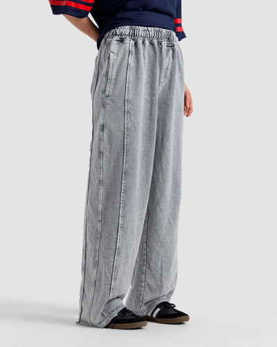 Washed Baggy Trousers With Raw Edges