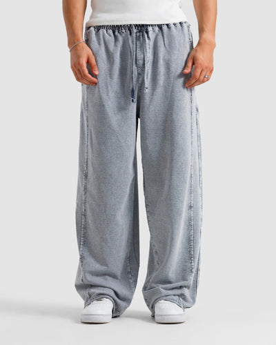 Washed Baggy Trousers With Raw Edges
