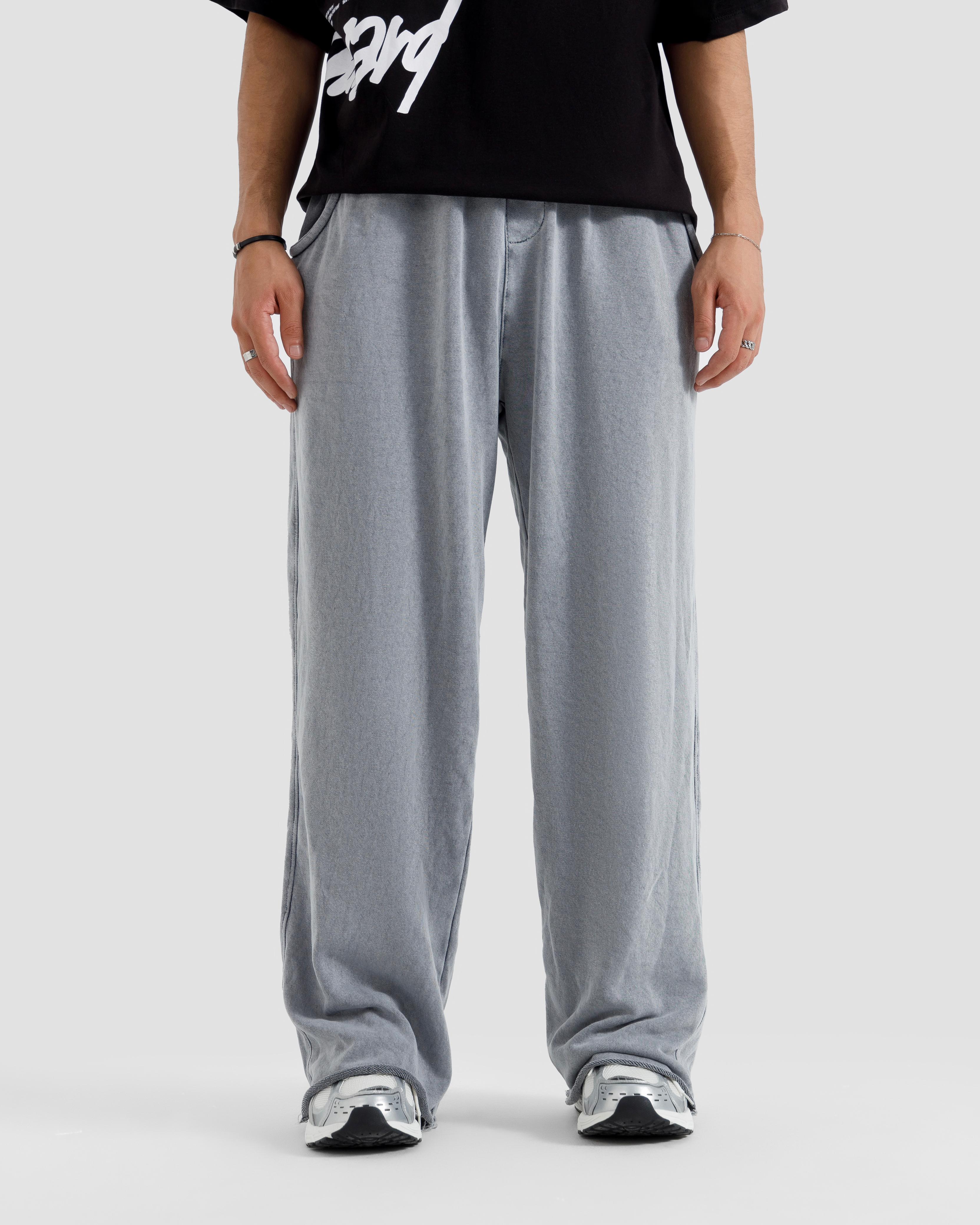 Washed Baggy Trousers With Raw Edges