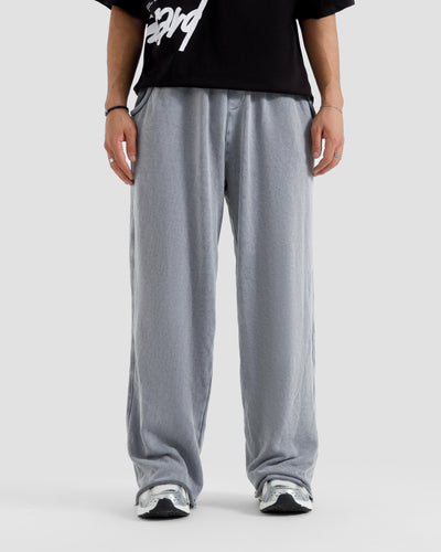 Washed Baggy Trousers With Raw Edges