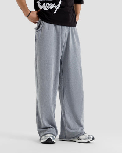 Washed Baggy Trousers With Raw Edges