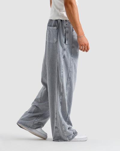 Washed Baggy Trousers With Raw Edges