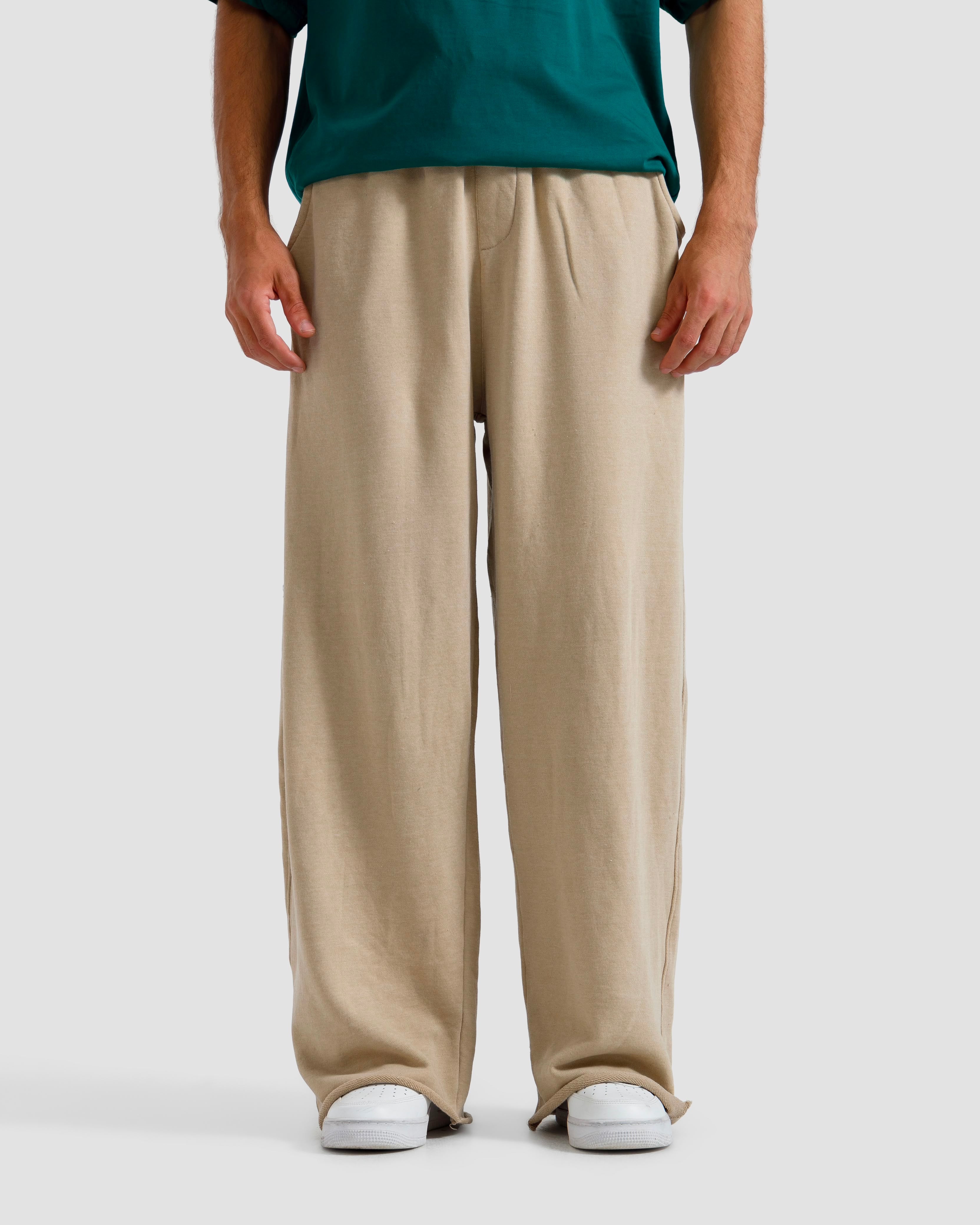 Washed Baggy Trousers With Raw Edges