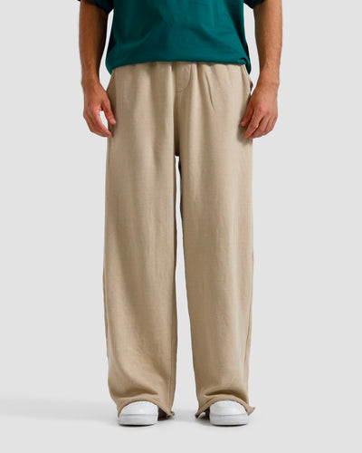 Washed Baggy Trousers With Raw Edges