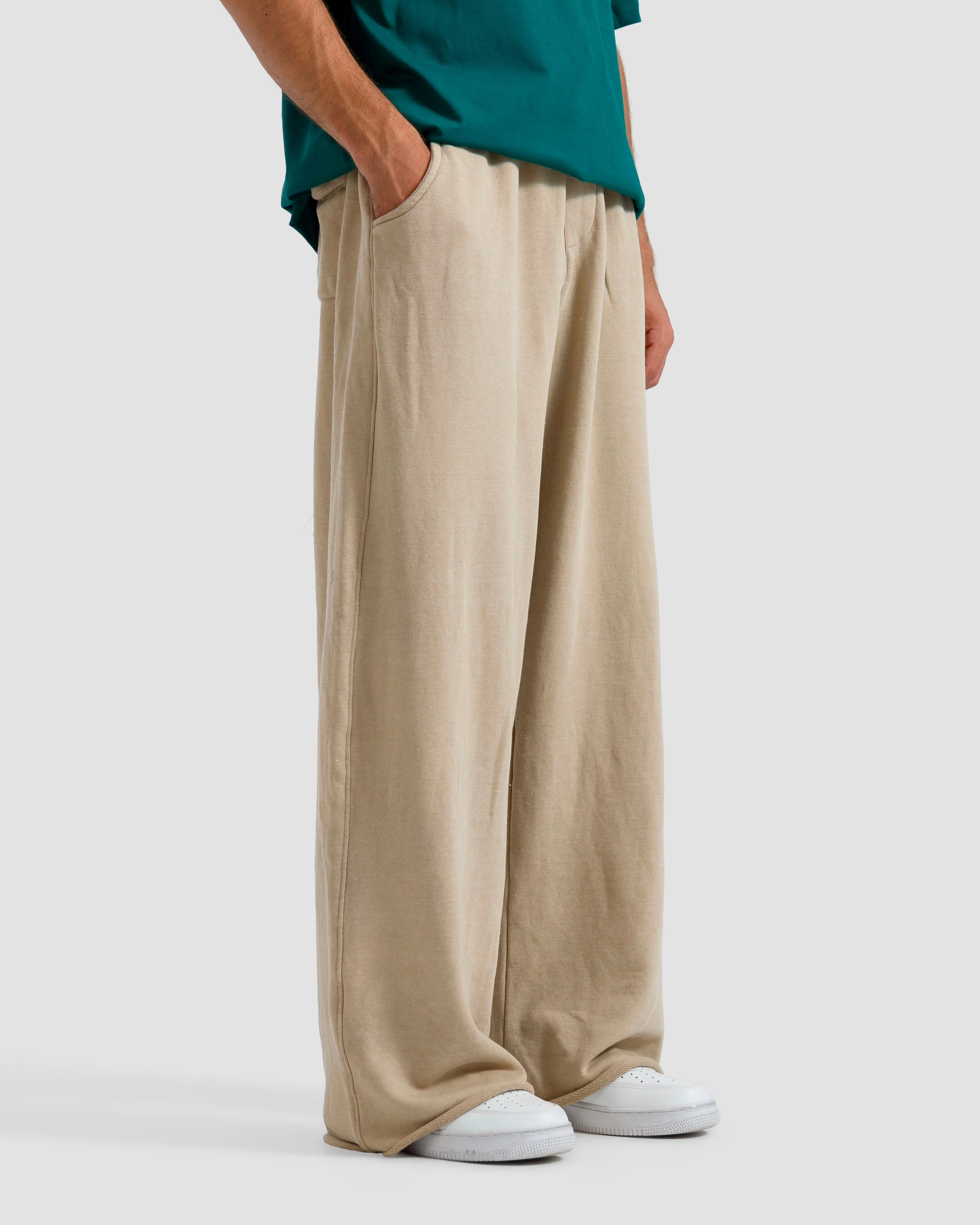 Washed Baggy Trousers With Raw Edges