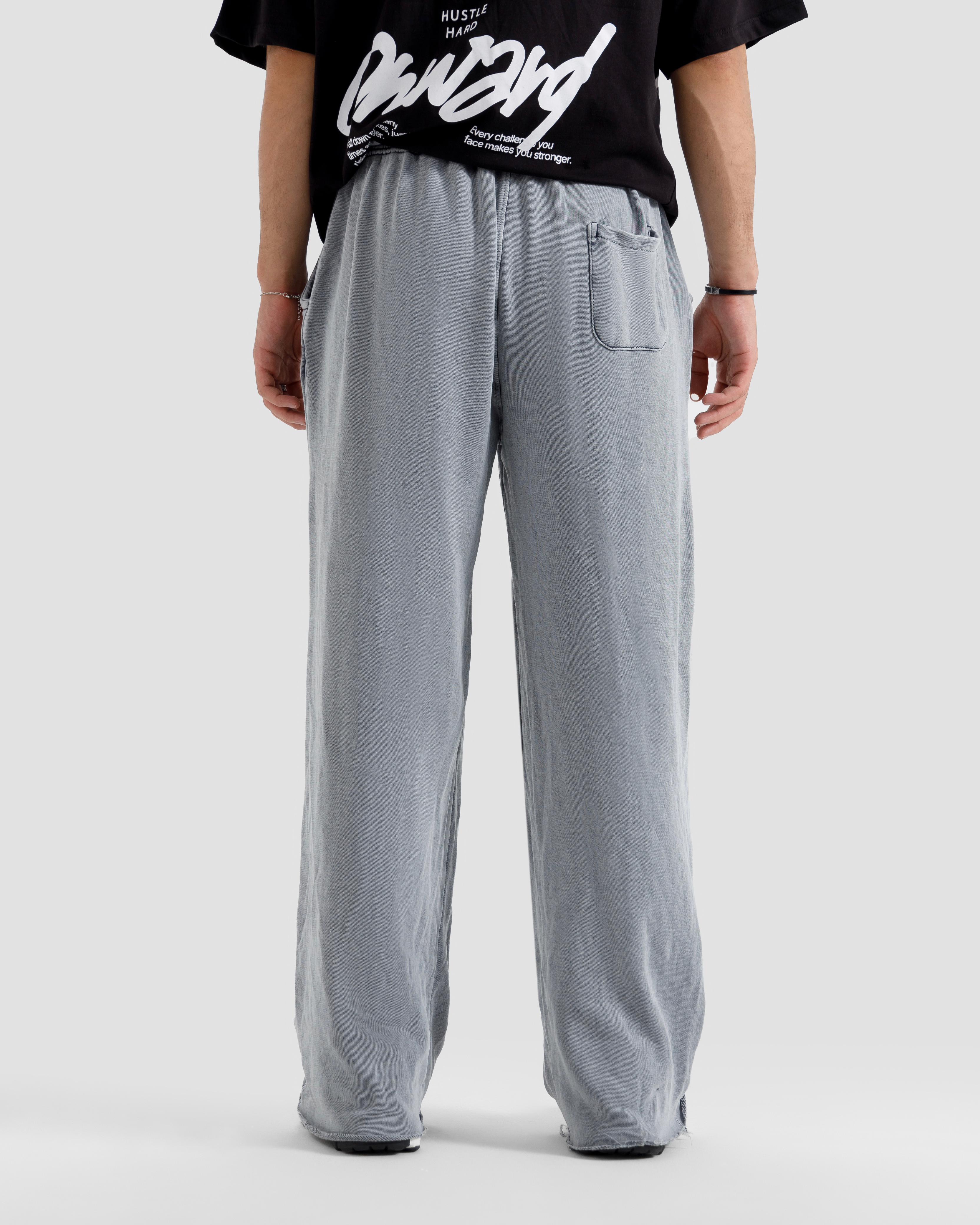 Washed Baggy Trousers With Raw Edges