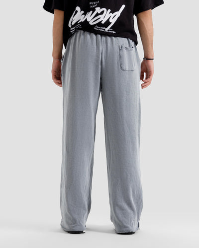 Washed Baggy Trousers With Raw Edges