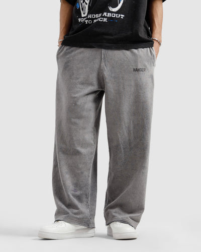 Washed Trousers With Raw Edges