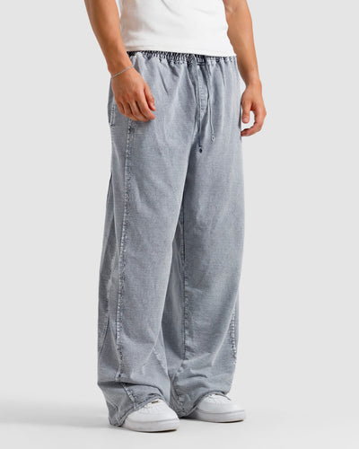 Washed Baggy Trousers With Raw Edges