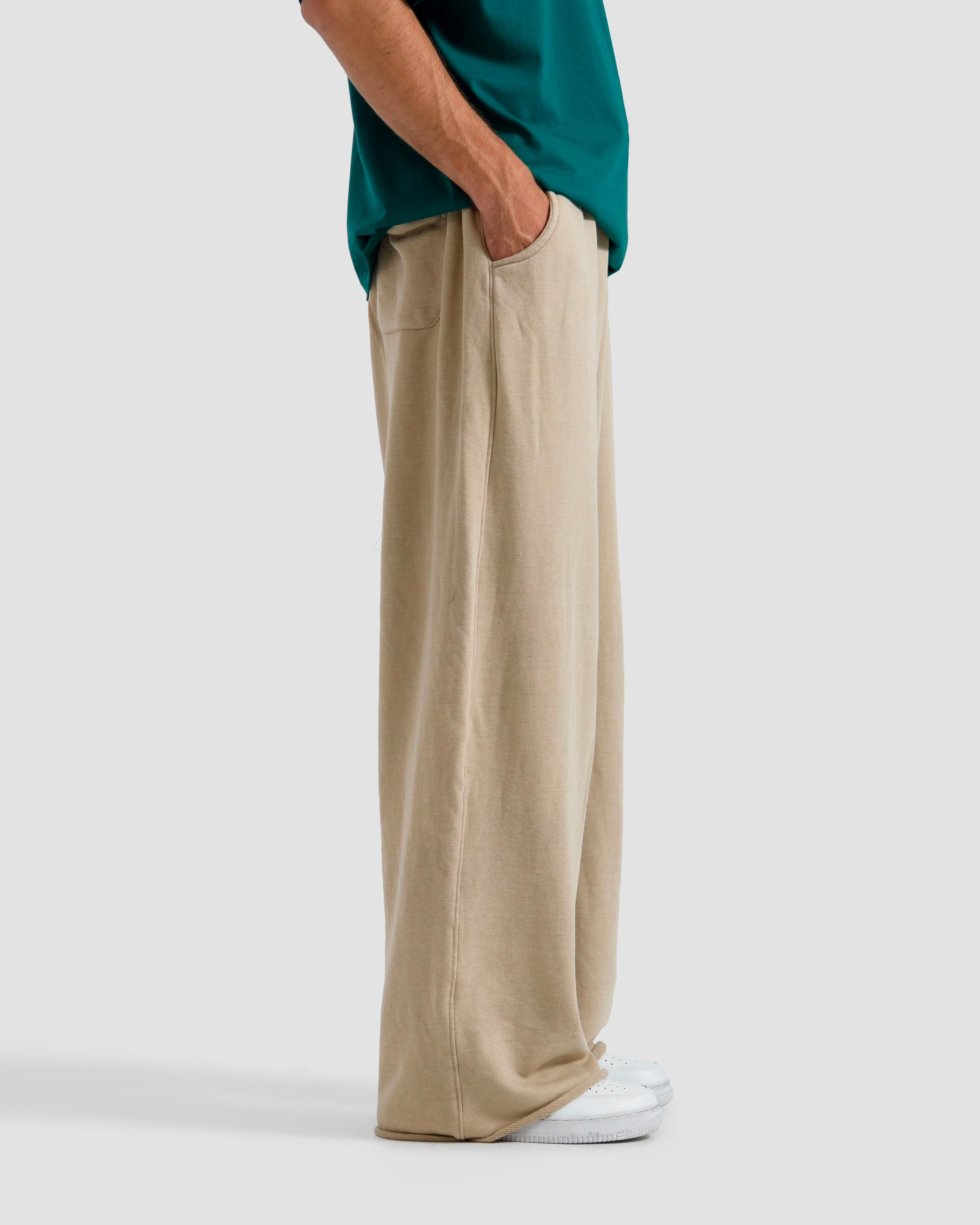 Washed Baggy Trousers With Raw Edges