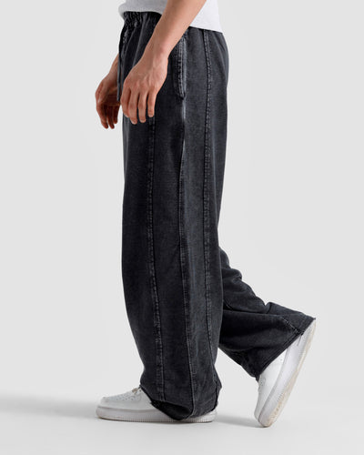 Washed Baggy Trousers With Raw Edges
