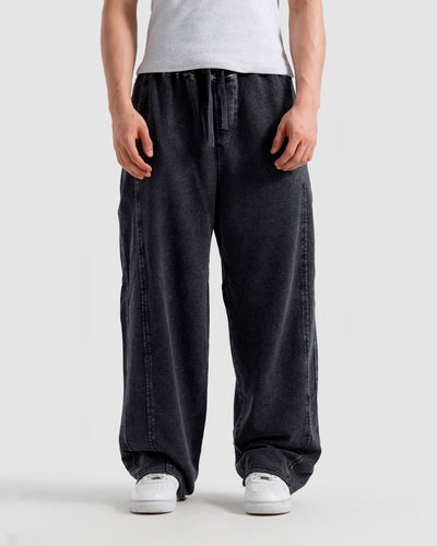 Washed Baggy Trousers With Raw Edges