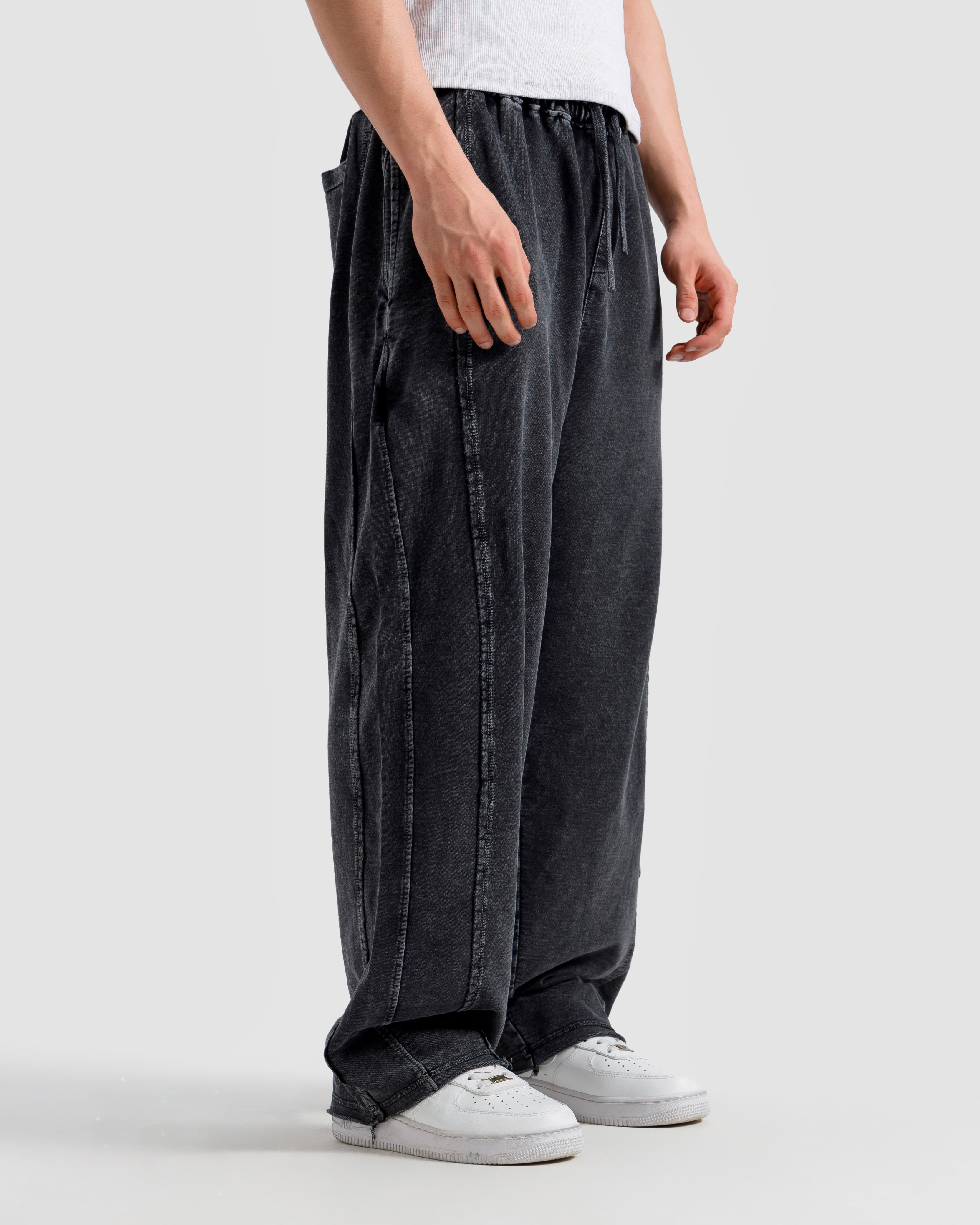 Washed Baggy Trousers With Raw Edges
