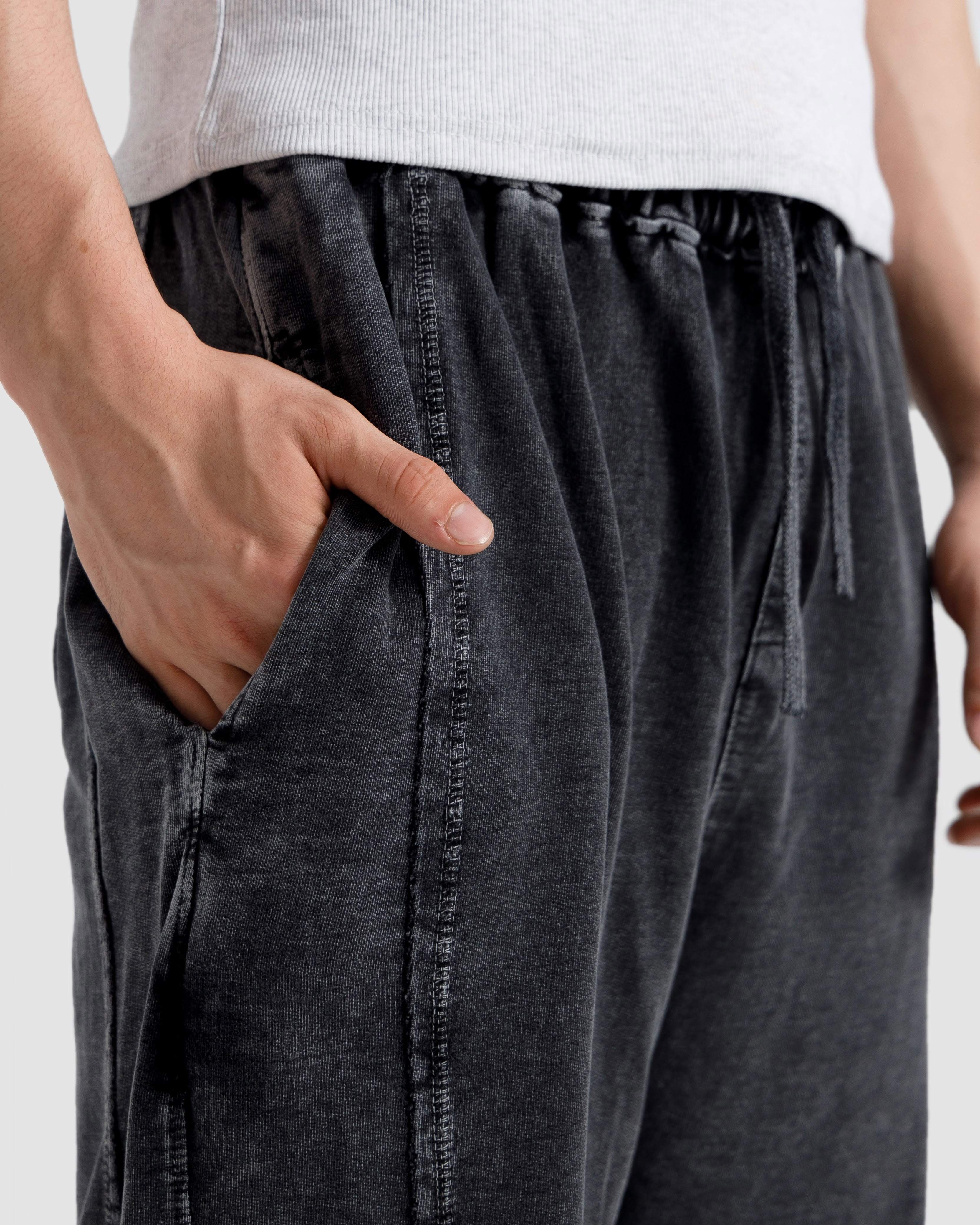 Washed Baggy Trousers With Raw Edges